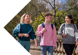 Three young students walking around the University of Glasgow campus.