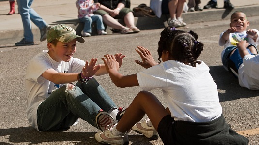 Boy and Girl exhibit friendship in Morro Bay Parade. Photo: Michael 'Mike' L. Bairder.